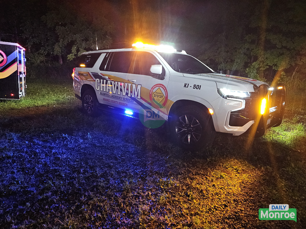 Chavivim members inspecting the new fleet vehicle and its equipment