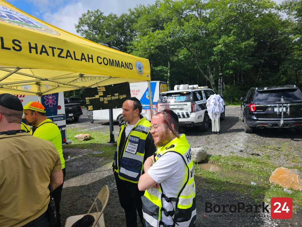 Daytime staging beside the Catskills Hatzalah Command tent as the search continues