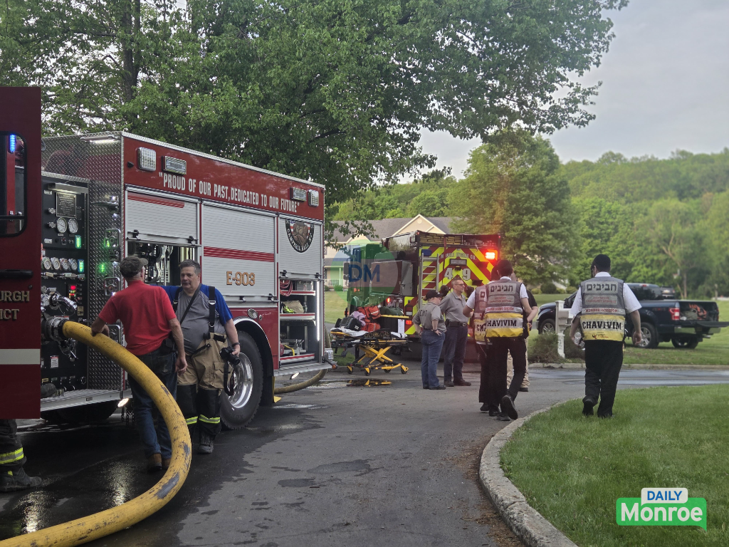 Chavivim members assisting firefighters at the Campbell Hall scene