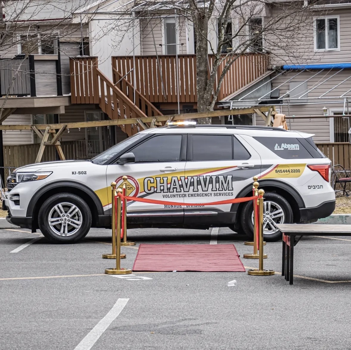 Chavivim coordinator at the podium during the new vehicle ceremony