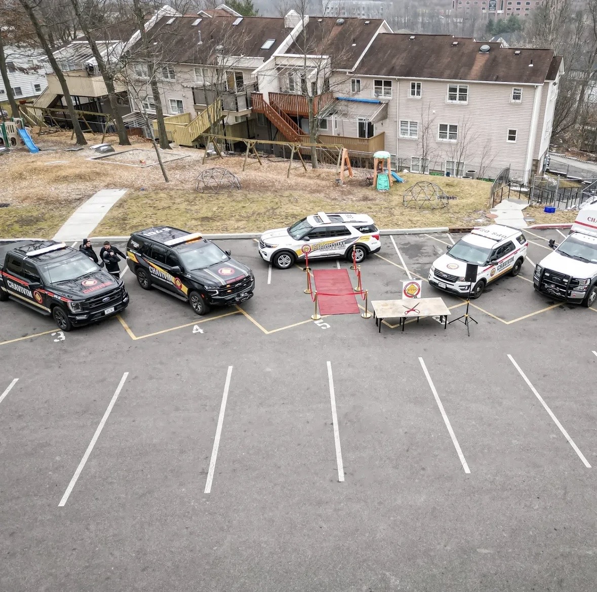 Aerial view of Orange County Chavivim fleet vehicles staged for the unveiling