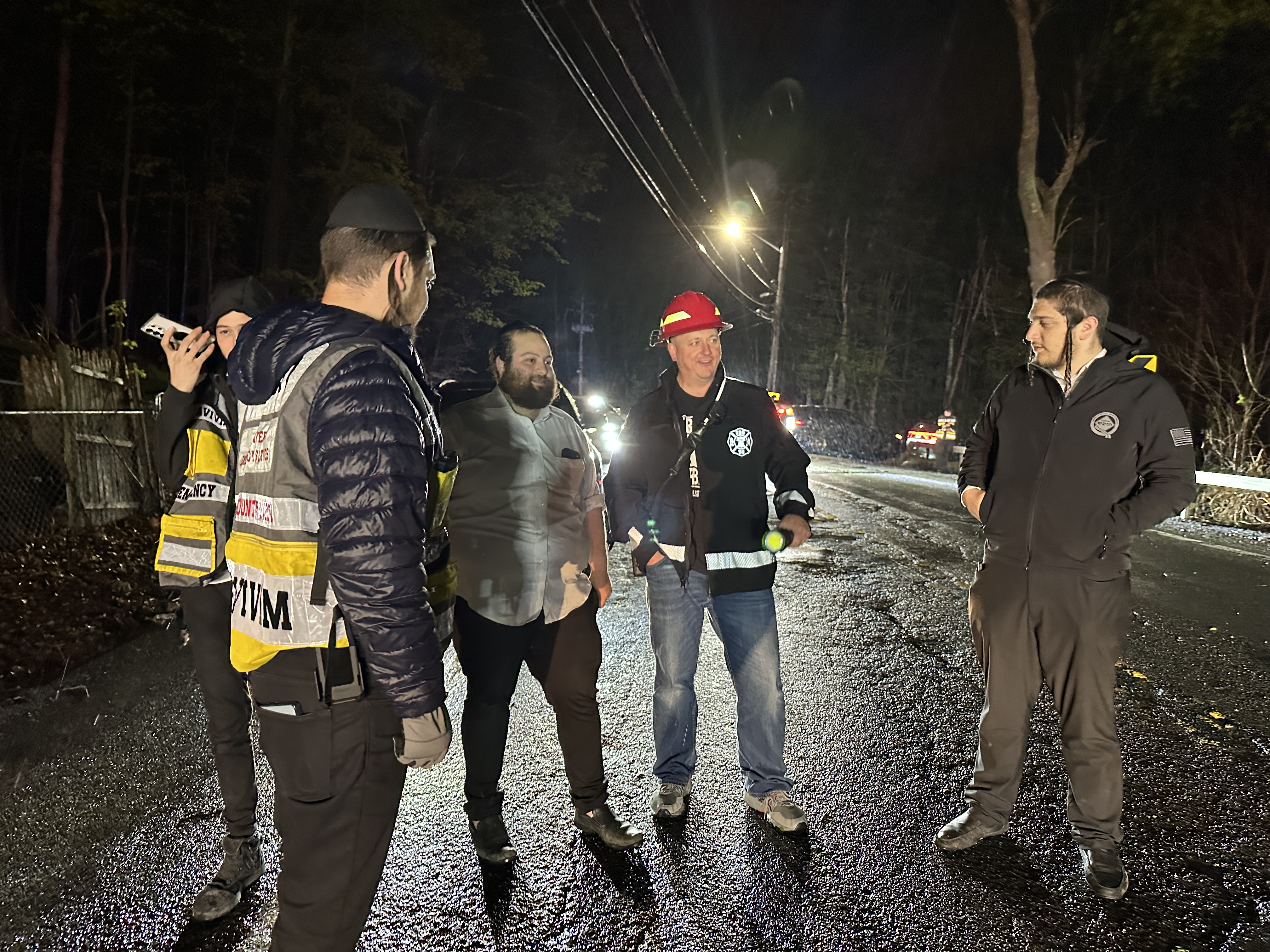 Orange County Chavivim members coordinating with the South Blooming Grove FD chief on Route 208