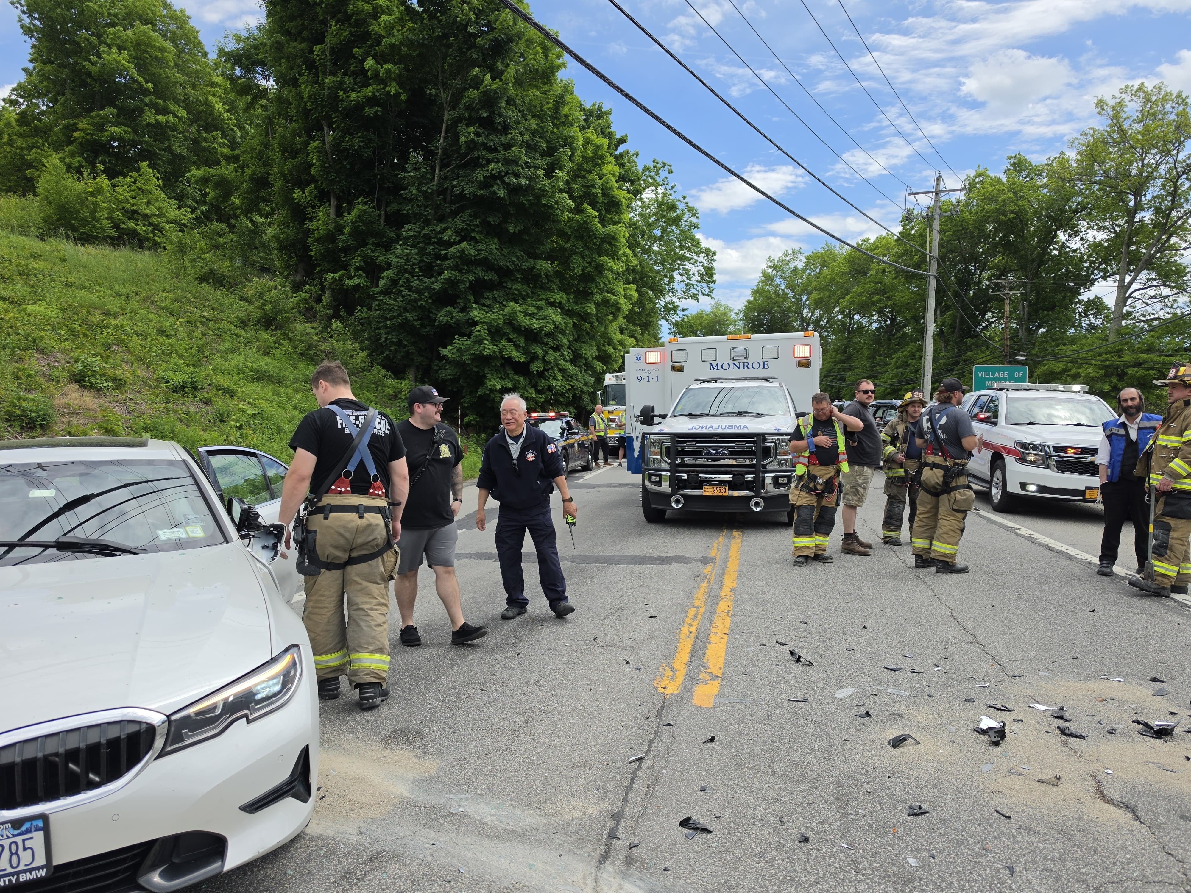 A Kiryas Joel Hatzalah ambulance and Monroe EMS on scene with members and firefighters at the second crash on NY-208